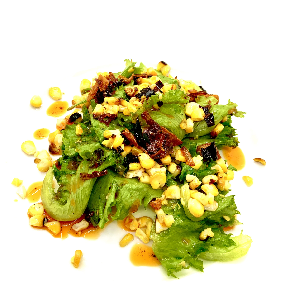 Salad with corn and greens on a white background
