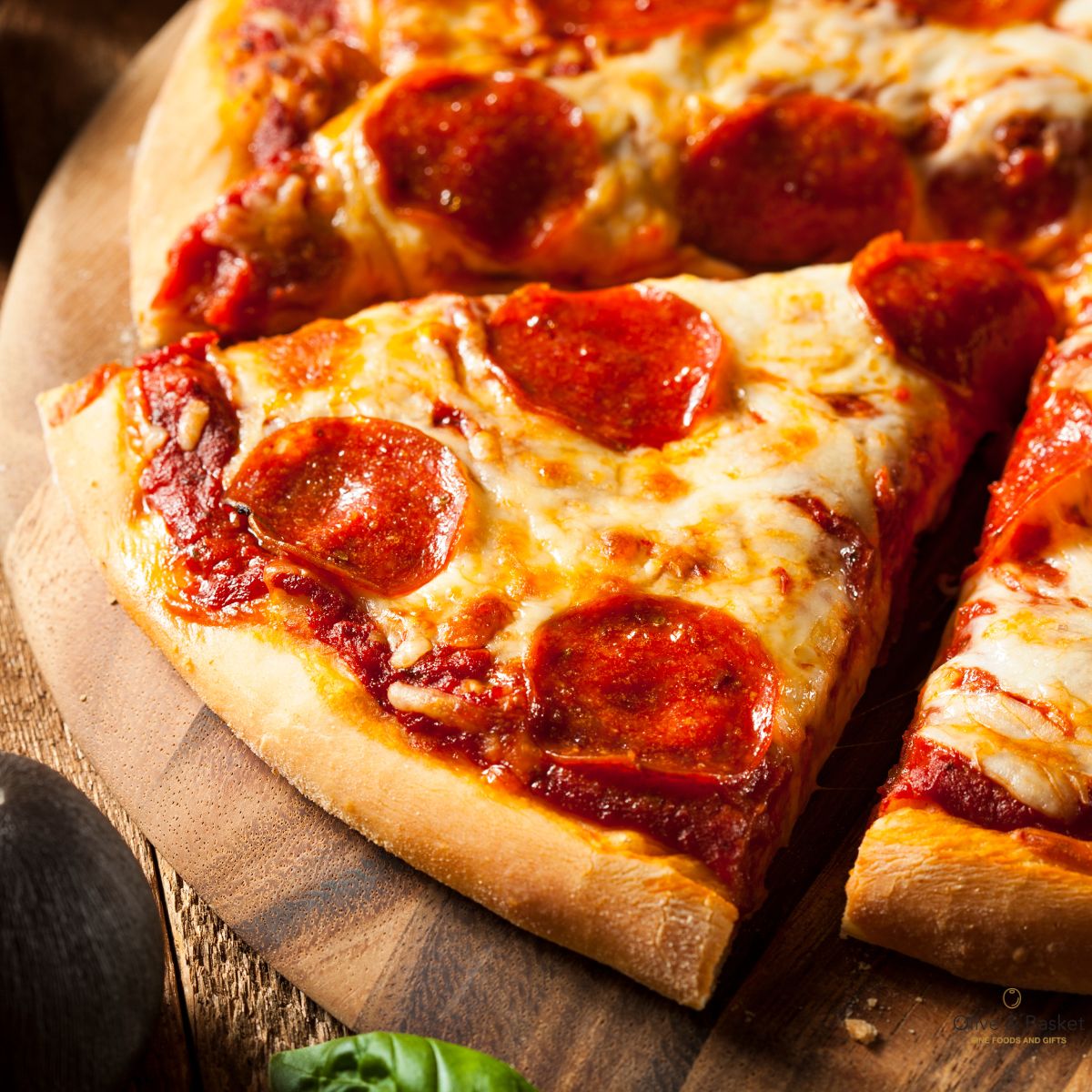 Pepperoni pizza on a wooden board with a close-up view