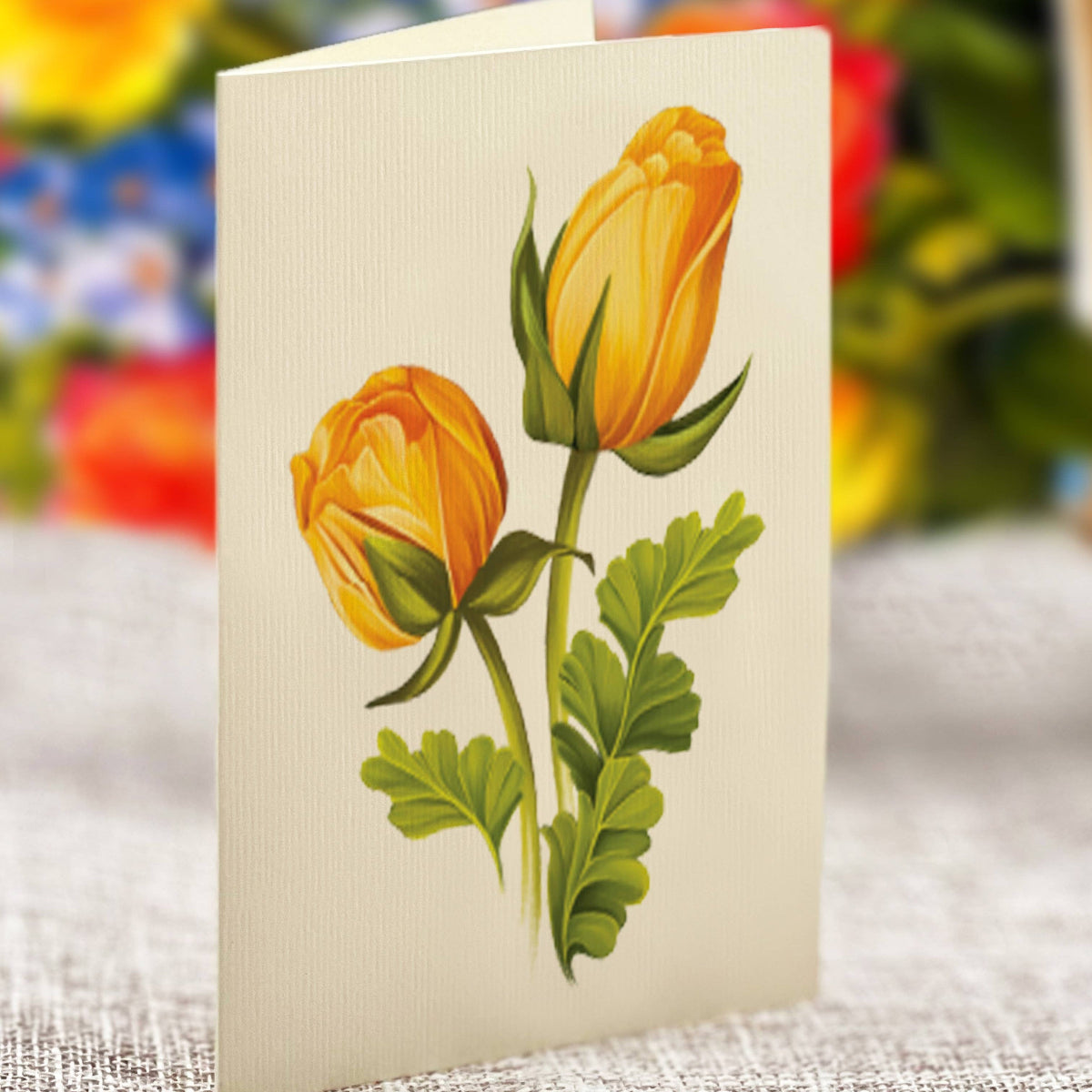 Greeting card with yellow flowers on a textured surface