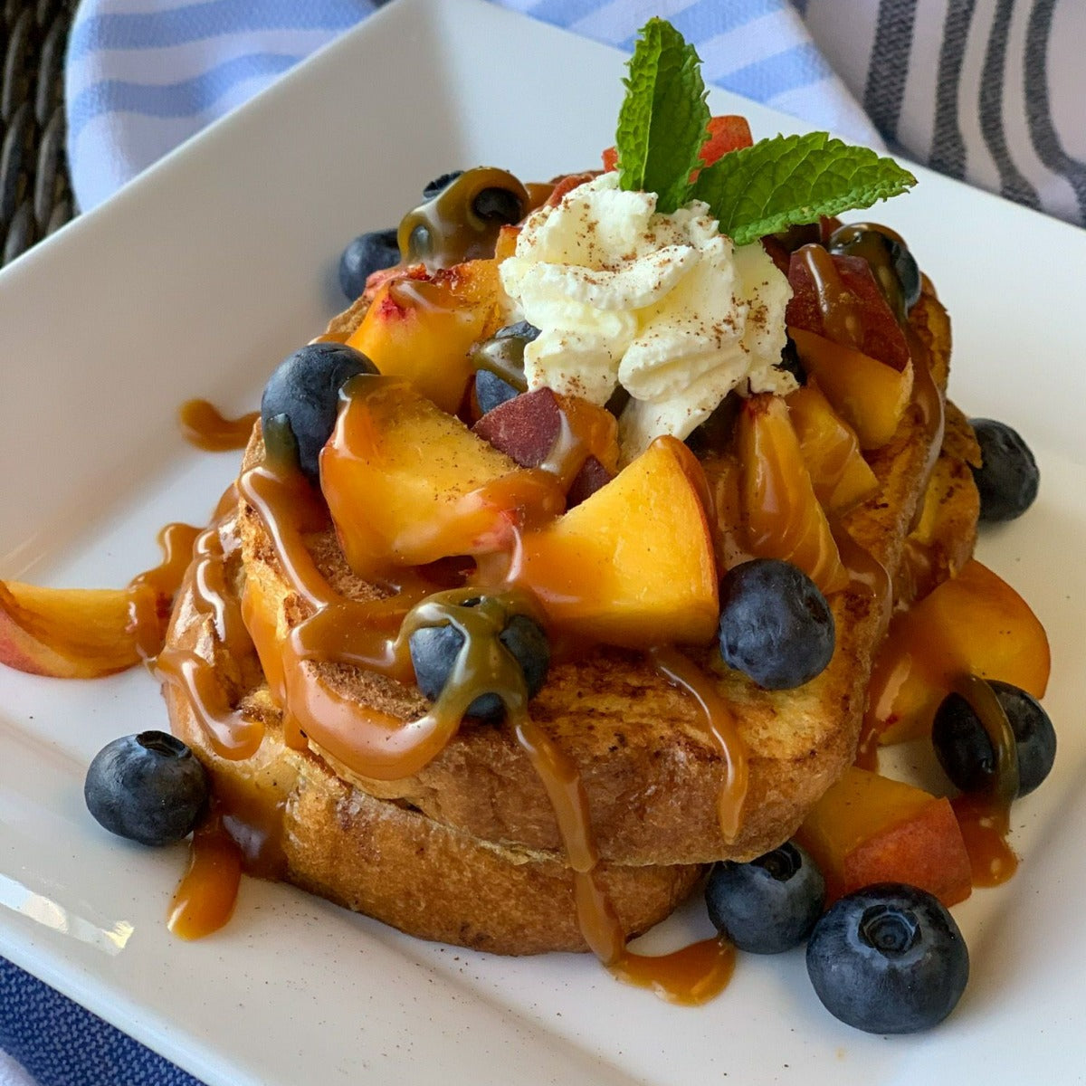 french toast with caramel sauce, olive and basket