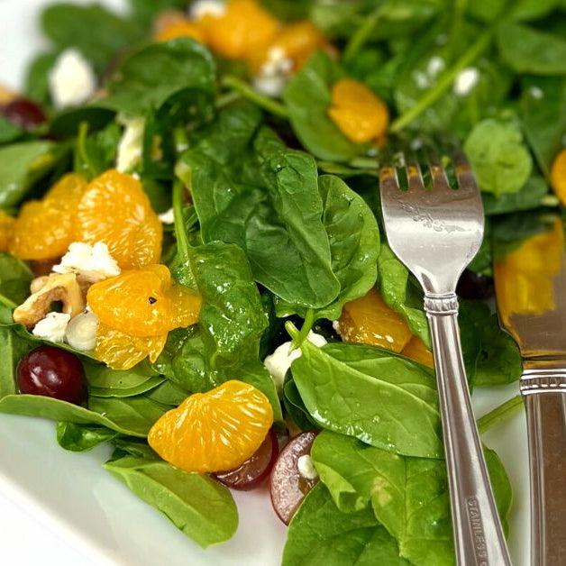 Spinach salad with fruit and Spiced pear vinegar and blood orange olive oil