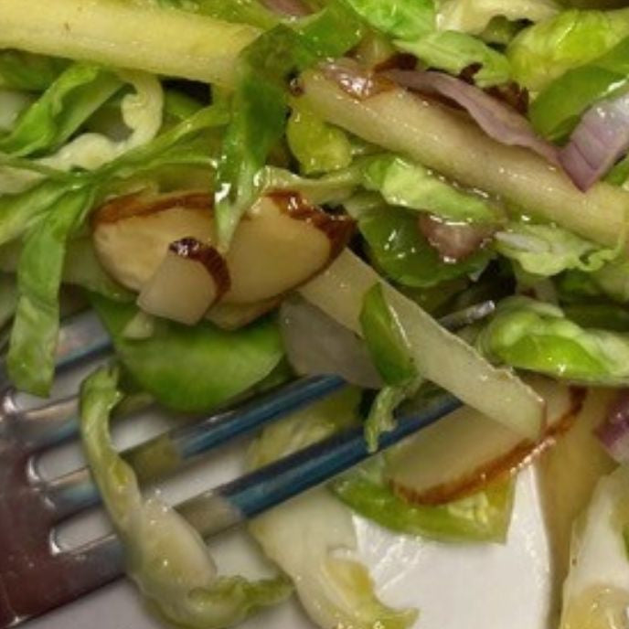 Brussels Sprouts Salad With Meyer Lemon & Honey Ginger Dressing
