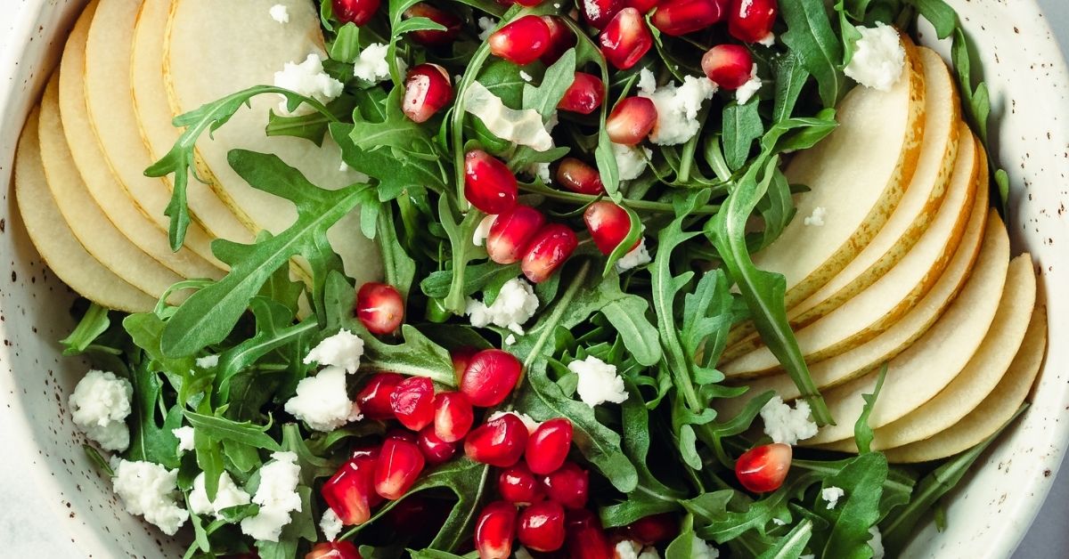 pomegranate & pear green salad with ginger dressing Pomegranate, Pear & Apple Salad with Ginger Dressing