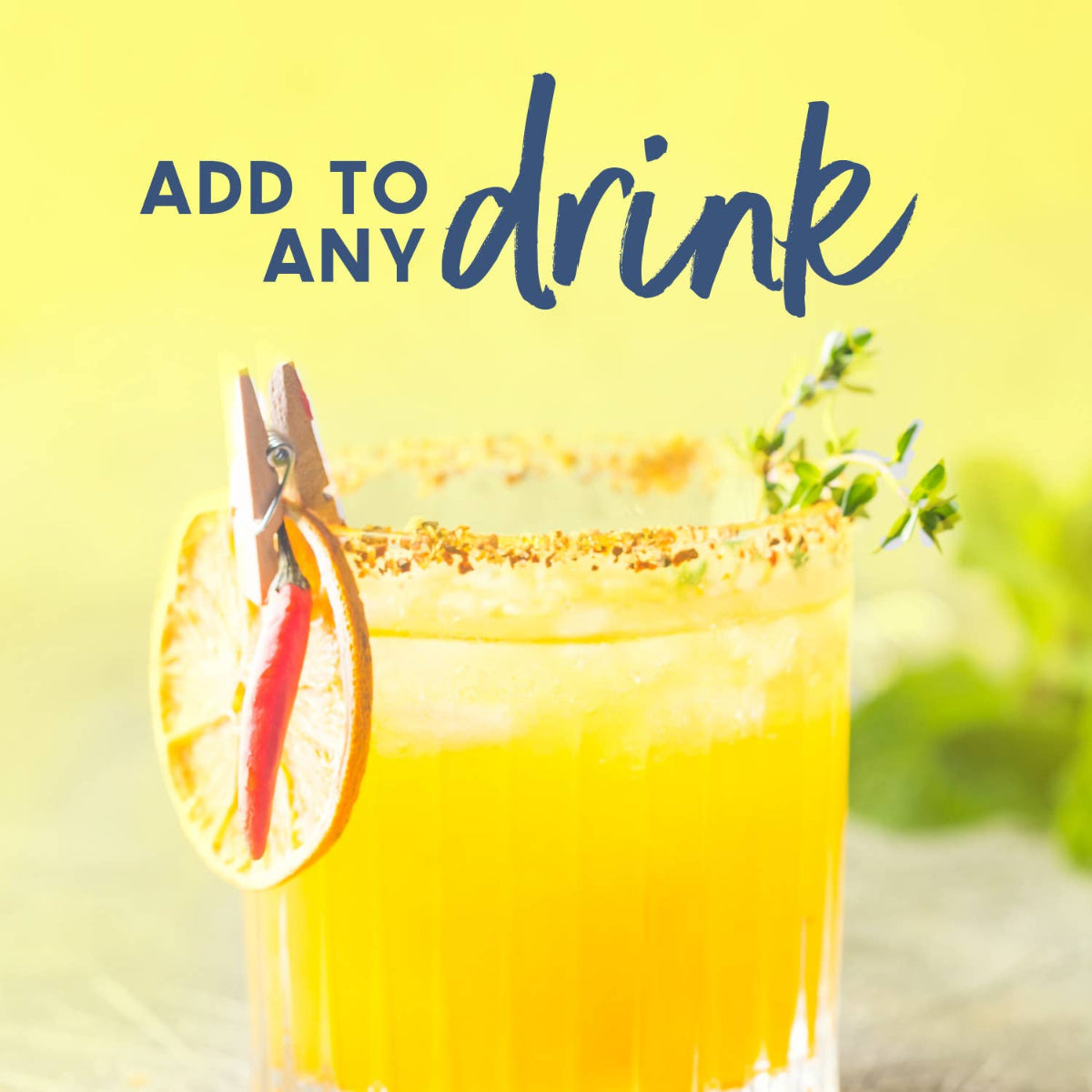 Glass of orange juice with garnishes on a yellow background with text 'ADD TO ANY drink'.