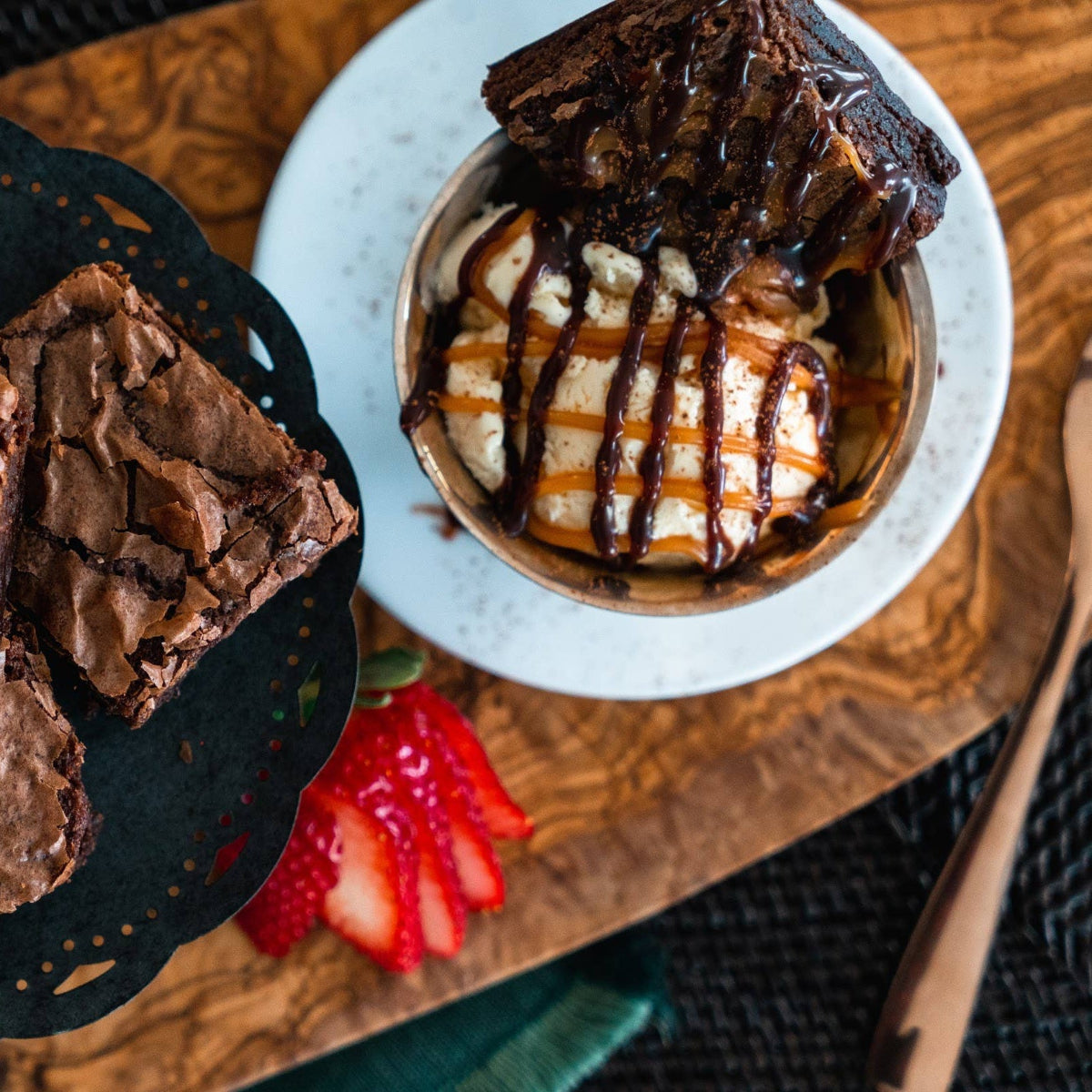 caramel sauce over brownies and ice cream