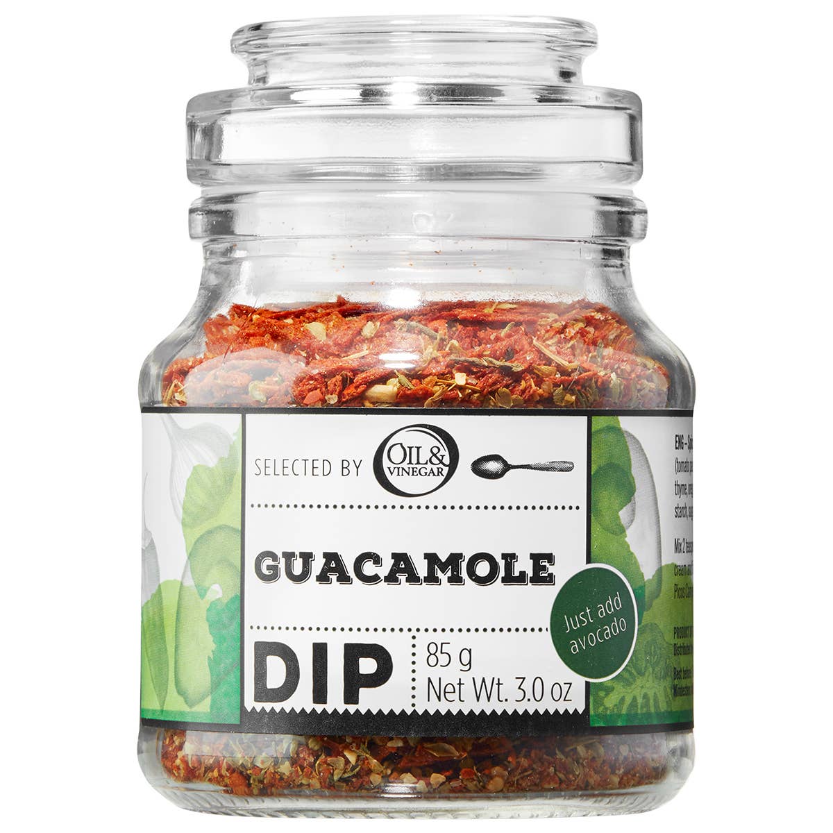 A glass jar containing guacamole dip mix with visible herbs and spices, labeled 'Guacamole Dip' from Olea’s Garden brand.