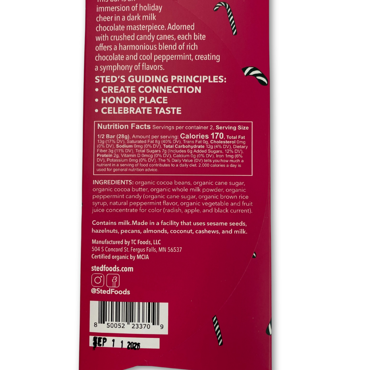 Back of a chocolate bar packaging with text and nutrition information on a white background