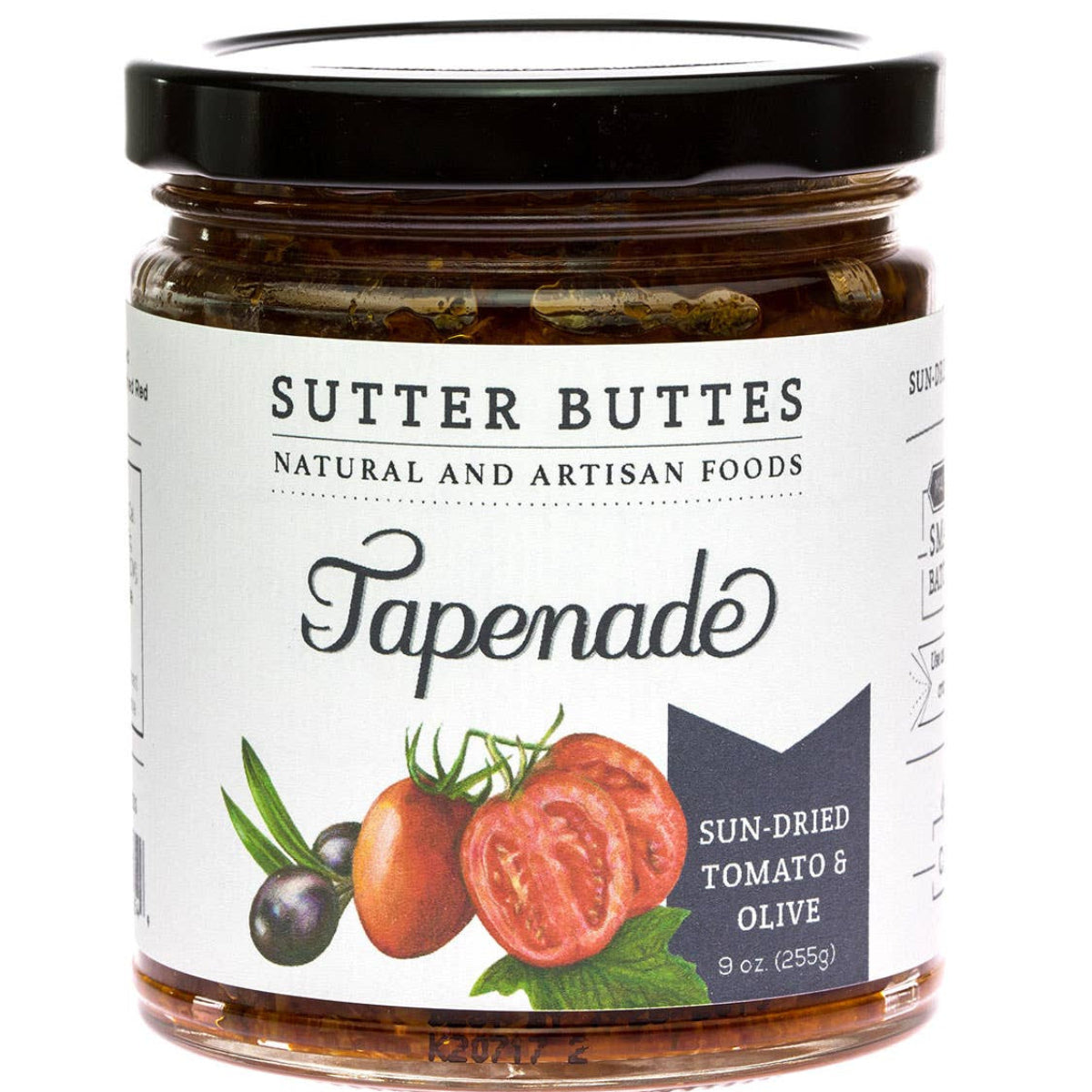 Jar of Sutter Buttes Tapenade with sun-dried tomato and olive label on a white background