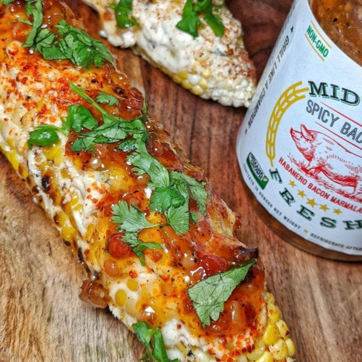 spicy bacon jam on corn of the cob