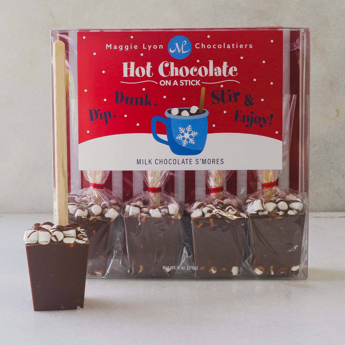 Maggie Lyon Chocolatiers hot chocolate on a stick packaging with a sample in front.