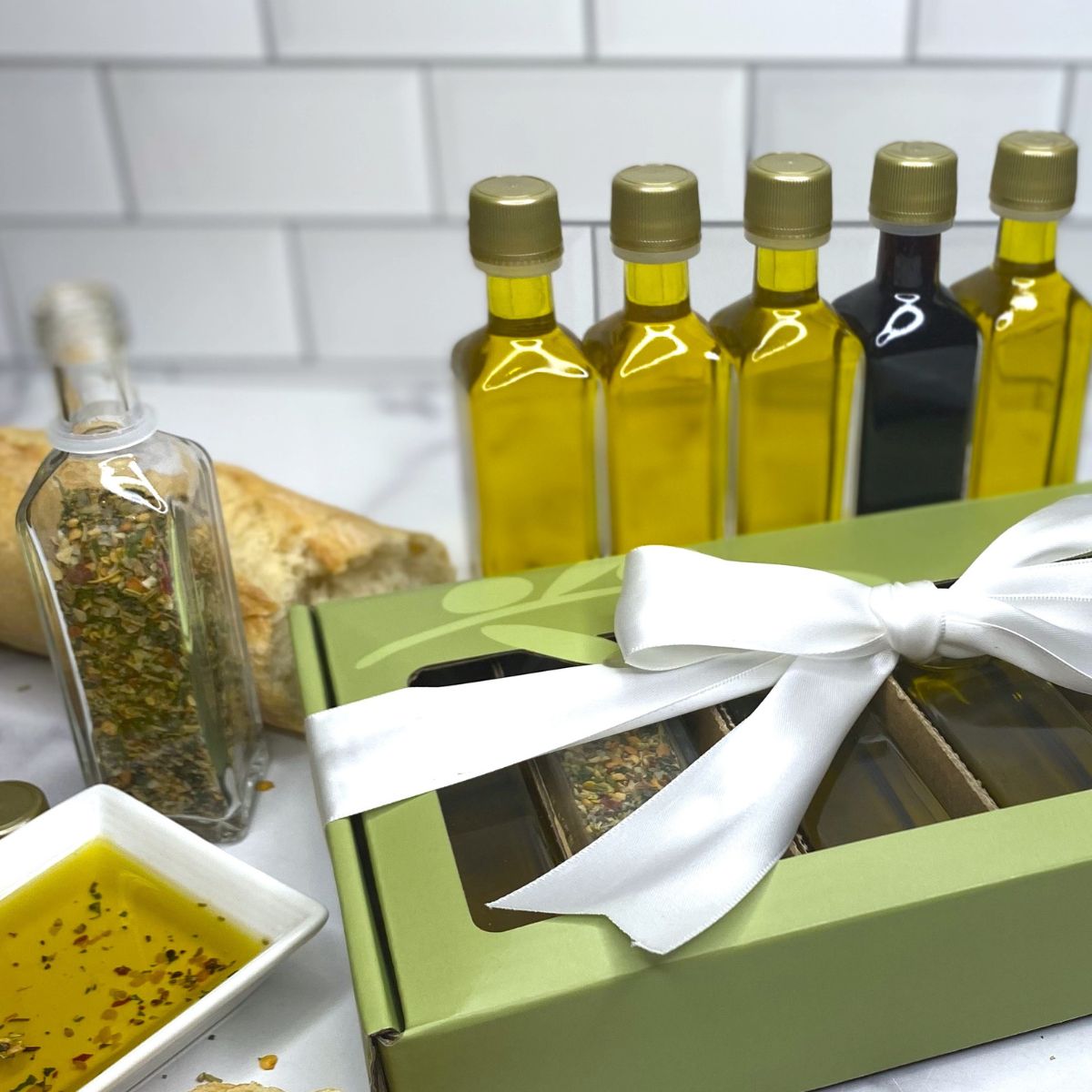 A starter collection of our 6 best selling vinegar, oils, and bread dipping herb mix. 