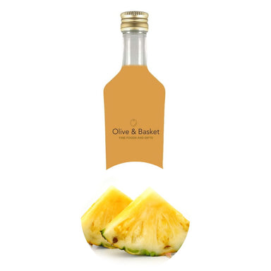 Bottle of Pineapple White Balsamic Vinegar with icon featuring two triangular slices of pineapple.