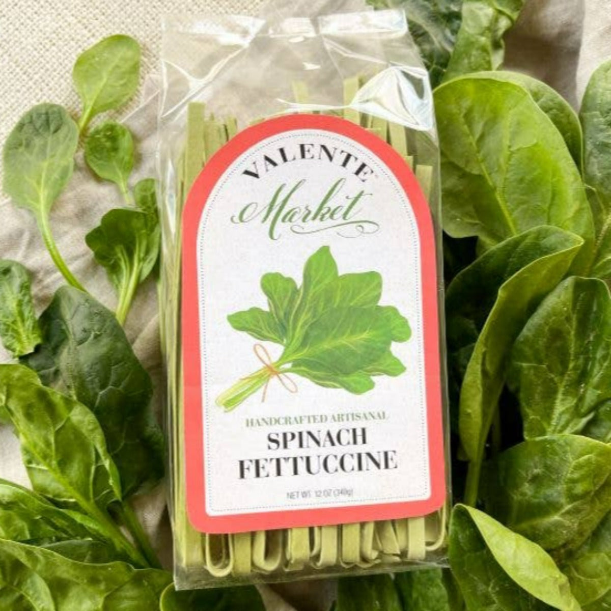 valente spinach fettucine, handcrafted, olive and basket
