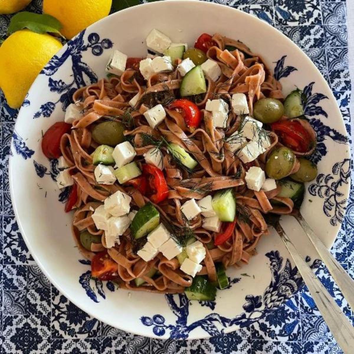 tomato and basil fettuccine, valente pasta, olive and basket
